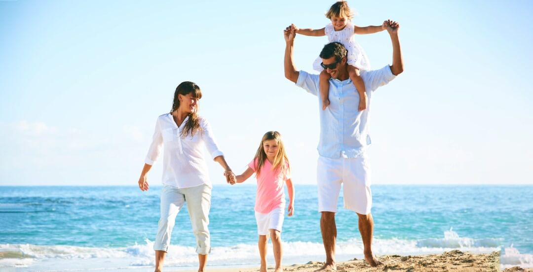 Family enjoying beach